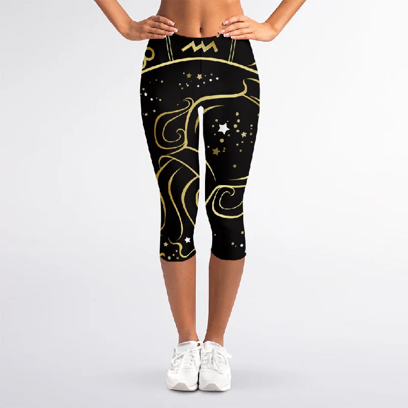 Gold And Black Aquarius Sign Print Women's Capri Leggings